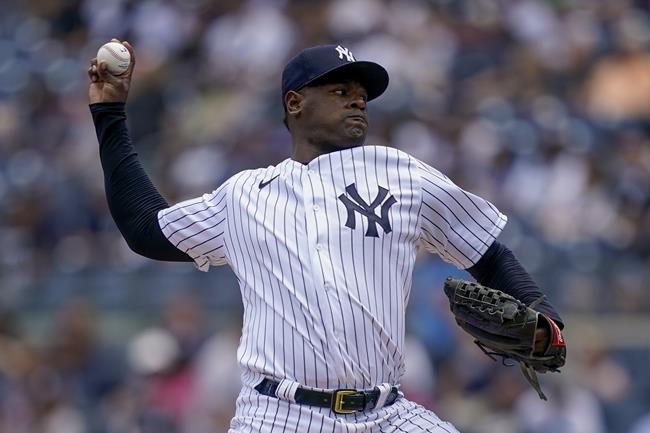 New York Yankees starting pitcher Luis Severino (40) throws in the first inning of a baseball game against the Detroit Tigers, Saturday, June 4, 2022, in New York. (AP Photo/John Minchillo)