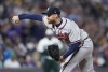 Atlanta Braves relief pitcher Collin McHugh works against the Colorado Rockies during the seventh inning of a baseball game Saturday, June 4, 2022, in Denver. (AP Photo/David Zalubowski)