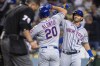 New York Mets' Jeff McNeil, right, congratulates Pete Alonso, who hit a two-run home run against the Los Angeles Dodgers during the third inning of a baseball game in Los Angeles, Saturday, June 4, 2022. (AP Photo/Alex Gallardo)