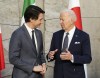 Prime Minister Justin Trudeau and U.S. President Joe Biden talk as they take part in a G7 family photo at NATO headquarters in Brussels, Belgium on Thursday, March 24, 2022. THE CANADIAN PRESS/Sean Kilpatrick