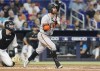 San Francisco Giants Donovan Walton hits a grand slam during the fourth inning of a baseball game against the Miami Marlins, Sunday, June 5, 2022, in Miami. (AP Photo/Marta Lavandier)