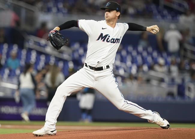 Miami Marlins pitcher Braxton Garrett aims a pitch during the first inning of a baseball game against the San Francisco Giants, Sunday, June 5, 2022, in Miami. (AP Photo/Marta Lavandier)