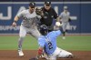 Chicago White Sox shortstop Danny Mendick (20) tags out Tampa Bay Rays' Yandy Diaz (2) who was trying to steal second base as umpire Hunter Wendelstedt watches during the seventh inning of a baseball game, Sunday, June 5, 2022, in St. Petersburg, Fla. (AP Photo/Phelan M. Ebenhack)