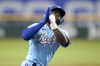 Texas Rangers' Adolis Garcia celebrates as he runs the bases after hiting a solo home during the second inning of a baseball game against the Seattle Mariners in Arlington, Texas, Sunday, June 5, 2022. (AP Photo/LM Otero)