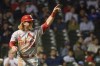 St. Louis Cardinals' Harrison Bader celebrates scoring during the 11th inning on a double by Brendan Donovan during a baseball game, Sunday, June 5, 2022, at Wrigley Field in Chicago. (AP Photo/Mark Black)