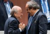 FILE - FIFA president Sepp Blatter is greeted by UEFA President Michel Platini, right, after Blatter's re-election as president at the Hallenstadion in Zurich, Switzerland, on May 29, 2015. Sepp Blatter and Michel Platini enter a criminal court Wednesday charged with defrauding world soccer body FIFA. It's an 11-day trial of two men once the most powerful in the world's favorite sport. (Patrick B. Kraemer/Keystone via AP, File)