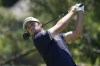 Davis Riley hits his drive on the second hole during the third round of the Memorial golf tournament Saturday, June 4, 2022, in Dublin, Ohio. (AP Photo/Darron Cummings)