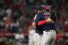 Boston Red Sox catcher Christian Vazquez, left, hugs starting pitcher Michael Wacha (52) after a 1-0 win over the Los Angeles Angels in a baseball game in Anaheim, Calif., Monday, June 6, 2022. (AP Photo/Ashley Landis)