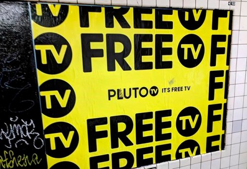 In this March 14, 2019, photo an advertisement for Pluto TV is displayed on the wall of a subway station in New York. THE CANADIAN PRESS/AP/Tali Arbel