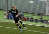 FILE - Liverpool goalkeeper Loris Karius looks at the ball after a fumble allowed Real Madrid's Gareth Bale to score his side's 3rd goal during the Champions League Final soccer match between Real Madrid and Liverpool at the Olimpiyskiy Stadium in Kiev, Ukraine, May 26, 2018. Liverpool has confirmed the departure of goalkeeper Loris Karius four years after his last appearance for the club when his concussion-related gaffes contributed to a 3-1 loss to Real Madrid in the 2018 Champions League final. (AP Photo/Darko Vojinovic, File)