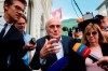 Former FIFA president Sepp Blatter is surrounded by the media as he leaves the Swiss Federal Criminal Court in Bellinzona, Switzerland, Wednesday, June 8, 2022. Blatter and former UEFA president Michel Platini have arrived at a Swiss criminal court for their 11-day trial on charges of defrauding FIFA, the world governing body of soccer. (Alessandro Crinari/Keystone via AP)