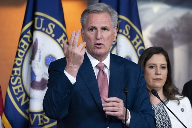 House Minority Leader Kevin McCarthy, of Calif., left, speaks during a news conference on the House Jan. 6 Committee, Thursday, June 9, 2022, with Rep. Elise Stefanik, R-N.Y., on Capitol Hill in Washington. (AP Photo/Jacquelyn Martin)