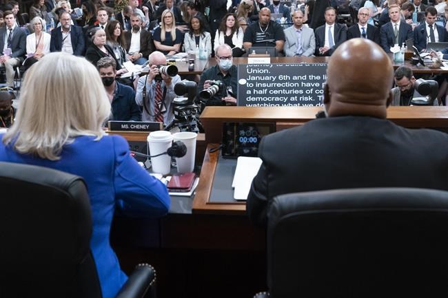 Vice Chair Liz Cheney, R-Wyo., left, listens as Chairman Bennie Thompson, D-Miss., gives an opening statement as the House select committee investigating the Jan. 6 attack on the U.S. Capitol holds its first public hearing to reveal the findings of a year-long investigation, on Capitol Hill in Washington, Thursday, June 9, 2022. (AP Photo/Alex Brandon, Pool)
