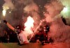 FILE - In this file photo dated Tuesday, Oct. 28, 2014, supporters of St. Pauli light fireworks during the German soccer cup second round match between FC St. Pauli and Borussia Dortmund at the Millerntor Stadium in Hamburg, Germany. (AP Photo/Michael Sohn, FILE)