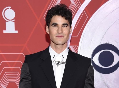 FILE - Darren Criss appear at the 74th annual Tony Awards in New York on Sept. 26, 2021. On Sunday, Criss will co-host with Julianne Hough a one-hour pre-Tony celebration at Radio City Music Hall. Criss and Hough will be handing out creative arts Tonys on Paramount+ and then pass hosting duties to Ariana DeBose for the main three-hour telecast on CBS from the same stage, live coast to coast for the first time.(Photo by Evan Agostini/Invision/AP, File)