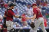 Arizona Diamondbacks catcher Carson Kelly, left, and pitcher Mark Melancon celebrate after a baseball game against the Philadelphia Phillies, Sunday, June 12, 2022, in Philadelphia. (AP Photo/Matt Slocum)