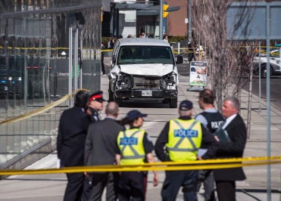 Police are seen near a damaged van in Toronto after a van mounted a sidewalk crashing into a number of pedestrians on Monday, April 23, 2018. Two years ago, on April 23, 2018, Alek Minassian rented a van and drove it down a busy Toronto sidewalk on a sunny afternoon, striking dozens along the two-kilometre route. He told police just hours after the attack that he sought retribution against society for years of sexual rejection by women. THE CANADIAN PRESS/Aaron Vincent Elkaim