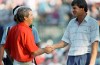 FILE - Curtis Strange, left, and Nick Faldo shake hands in Brookline, Mass., Sunday, June 19, 1988, after finishing the U.S. open with tie scores, forcing an 18-hole playoff round the following day at the Country Club in Brookline. Strange won the 18-hole playoff the next day. The U.S. Open returns to The Country Club in June 2022 for the first time since then. (AP Photo/Peter Southwick, File)