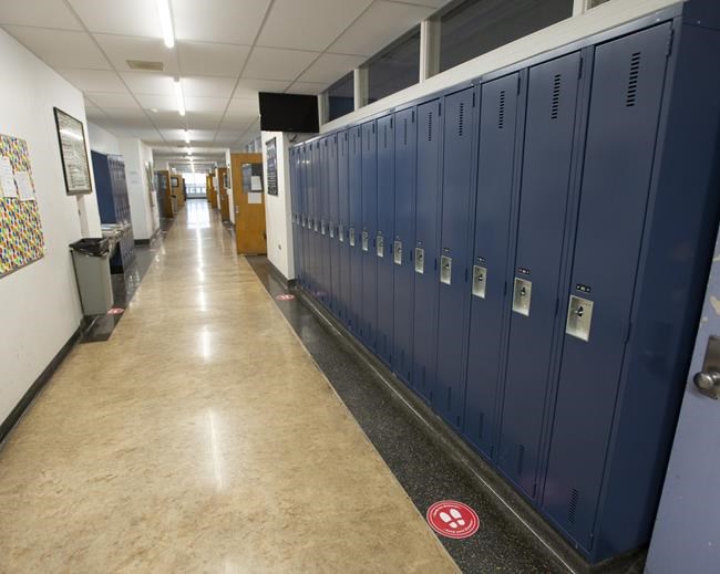 Lockers are seen at a school in Montreal on Tuesday, November 17, 2020. A suburban Montreal high school had to recall more than 900 yearbooks for 2021-22 after a racial slur was found hidden in one of the student's biographies.THE CANADIAN PRESS/Ryan Remiorz