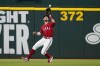 Texas Rangers left fielder Eli White settles beneath a Seattle Mariners' Jesse Winker flyout in the eighth inning of a baseball game, Friday, June 3, 2022, in Arlington, Texas. (AP Photo/Tony Gutierrez)