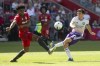 Orlando City's Mauricio Pereyra (right) has his shot blocked by Toronto FC's Ralph Priso during first half MLS action in Toronto, Saturday, May 14, 2022. Major League Soccer has signed a 10-year deal with Apple that will give the tech giant broadcast rights for every MLS match beginning in 2023. THE CANADIAN PRESS/Chris Young
