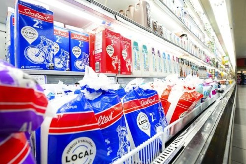 Milk and dairy products are displayed for sale at a grocery store in Aylmer, Que., on Thursday, May 26, 2022. Dairy industry observers are raising concerns about a lack of transparency in how the price of milk is set in Canada as a Crown corporation considers raising prices for the second time this year. THE CANADIAN PRESS/Sean Kilpatrick