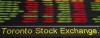Financial numbers flow on the digital ticker tape at the TMX Group in Toronto's financial district on May 9, 2014. THE CANADIAN PRESS/Darren Calabrese