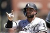 Chicago White Sox's Yoan Moncada reacts to his single against the Detroit Tigers in the fourth inning of a baseball game in Detroit, Wednesday, June 15, 2022. (AP Photo/Paul Sancya)