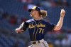 Milwaukee Brewers relief pitcher Josh Hader throws during the ninth inning of a baseball game against the Washington Nationals, Sunday, June 12, 2022, in Washington. (AP Photo/Nick Wass)