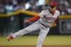 Cincinnati Reds starting pitcher Luis Castillo throws against the Arizona Diamondbacks during the fifth inning of a baseball game, Wednesday, June 15, 2022, in Phoenix. (AP Photo/Matt York)