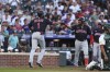 Cleveland Guardians' Amed Rosario, left, celebrates with Jose Ramirez after hitting a home run against the Colorado Rockies during the third inning of a baseball game Wednesday, June 15, 2022, in Denver. (AP Photo/Gabriel Christus)