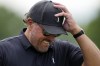 Phil Mickelson walks on the fourth hole during the first round of the U.S. Open golf tournament at The Country Club, Thursday, June 16, 2022, in Brookline, Mass. (AP Photo/Robert F. Bukaty)