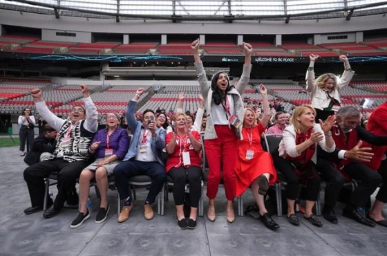 Musqueam First Nation Chief Wayne Sparrow, from left to right, Pavco Board Chair Gwendolyn Point, Squamish Nation councillor Wilson Williams, Tsleil-Waututh Nation Chief Jen Thomas and other dignitaries and politicians react after Vancouver was chosen as one of the host cities for the 2026 FIFA World Cup, at B.C. Place stadium in Vancouver, on Thursday, June 16, 2022. THE CANADIAN PRESS/Darryl Dyck
