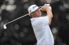 Patton Kizzire watches his shot on the 16th hole during the first round of the U.S. Open golf tournament at The Country Club, Thursday, June 16, 2022, in Brookline, Mass. (AP Photo/Julio Cortez)