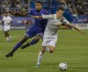 FC Cincinnati defender Alvas Powell, left, and CF Montreal midfielder Lassi Lappalainen battle during second half MLS action in Montreal on Saturday, May 28, 2022. CF Montréal is looking to keep its strong run of form going as it returns from Major League Soccer's two week international break with a match Saturday against Austin FC. THE CANADIAN PRESS/Peter McCabe