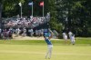 Scottie Scheffler watches his shot on the 18th hole during the second round of the U.S. Open golf tournament at The Country Club, Friday, June 17, 2022, in Brookline, Mass. (AP Photo/Charlie Riedel)