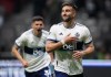 Vancouver Whitecaps' Lucas Cavallini, front, and Cristian Gutierrez celebrate Cavallini's penalty kick goal against FC Dallas during the second half of an MLS soccer game in Vancouver, on Wednesday, May 18, 2022. THE CANADIAN PRESS/Darryl Dyck