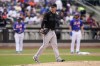 Miami Marlins starting pitcher Braxton Garrett (60) reacts after giving up an RBI single to New York Mets' Jeff McNeil in the second inning of a baseball game, Saturday, June 18, 2022, in New York. (AP Photo/John Minchillo)