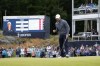 Rory McIlroy, of Northern Ireland, reacts after putting on the 11th hole during the third round of the U.S. Open golf tournament at The Country Club, Saturday, June 18, 2022, in Brookline, Mass. (AP Photo/Charles Krupa)