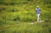 Joel Dahmen jogs to the 12th hole during the third round of the U.S. Open golf tournament at The Country Club, Saturday, June 18, 2022, in Brookline, Mass. (AP Photo/Robert F. Bukaty)