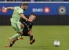 CF Montréal midfielder Joaquín Torres (10) battles Austin FC forward Jon Gallagher (17) during first half MLS action in Montreal on Saturday, June 18, 2022THE CANADIAN PRESS/Peter McCabe