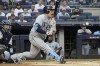 Tampa Bay Rays' Ji-Man Choi swings at a pitch during the first inning of the team's baseball game against the New York Yankees, Thursday, June 16, 2022, in New York. Choi walked on the at-bat. (AP Photo/Bebeto Matthews)