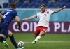 FILE - Poland's Maciej Rybus in action during the Euro 2020 soccer championship group E match between Poland and Slovakia at Gazprom arena stadium in St. Petersburg, Russia, June 14, 2021. Poland won't consider defender Maciej Rybus in its plans for the World Cup in Qatar after he signed a new contract with a Russian club. The Polish soccer federation said on Monday June 20, 2022, coach Czesław Michniewicz told Rybus that he would be left out of the squad for Nations League games in September and out of Poland's plans for the World Cup because of his “current club situation.” (Kirill Kudryavtsev/Pool via AP, File)