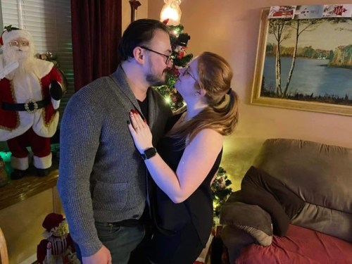 Alexandria Gilles and Eric Thang embrace in an undated handout photo. The Newmarket, Ont., couple will celebrate their nuptials this fall at a community hall -- a location they are moving their big day to because of costs. THE CANADIAN PRESS/HO-Alexandria Gilles and Eric Thang **MANDATORY CREDIT**