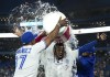 Toronto Blue Jays first baseman Vladimir Guerrero Jr. (27) reacts after being doused with water by Teoscar Hernandez (37) after hitting the game winning RBI single to defeat the Baltimore Orioles during tenth inning American League, MLB baseball action in Toronto on June 15, 2022. Guerrero Jr. was named AL player of the week on Tuesday after hitting .407 with three home runs and seven RBIs over seven games. THE CANADIAN PRESS/Nathan Denette