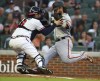 San Francisco Giants shortstop Brandon Crawford races the throw home to Atlanta Braves catcher Travis d' Arnaud during the fourth inning of a baseball game on Tuesday, June 21, 2022, in Atlanta. Crawford was called out on the play but after a review was ruled safe to take a 6-5 lead. (Curtis Compton Atlanta Journal-Constitution via AP)