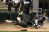 Chicago White Sox's Josh Harrison slides safely into home plate on a Luis Robert single during the sixth inning of a baseball game against the Toronto Blue Jays Wednesday, June 22, 2022, in Chicago. (AP Photo/Paul Beaty)