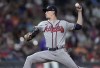 Atlanta Braves starting pitcher Max Fried works against the Colorado Rockies during the eighth inning of a baseball game Friday, June 3, 2022, in Denver. (AP Photo/David Zalubowski)