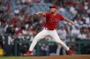 Los Angeles Angels starting pitcher Reid Detmers (48) throws during the third inning of a baseball game in Anaheim, Calif., Tuesday, June 21, 2022. (AP Photo/Ashley Landis)