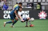 York United's Osaze De Rosario, left, and Vancouver Whitecaps' Erik Godoy vie for the ball during the first half of a Canadian Championship semifinal soccer match, in Vancouver, on Wednesday, June 22, 2022. THE CANADIAN PRESS/Darryl Dyck